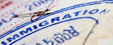 Immigration stamp inside a passport
