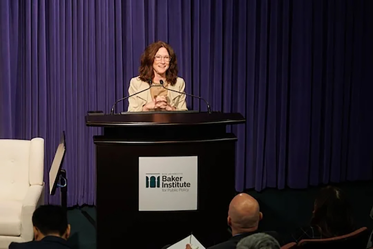 Rebecca Keiser standing at podium