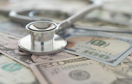 A stethoscope on American paper currency.