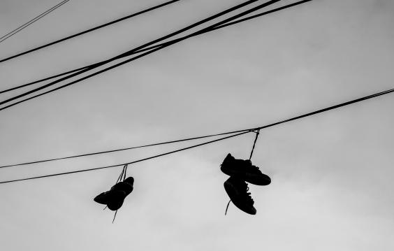Shoes hang from a power line.