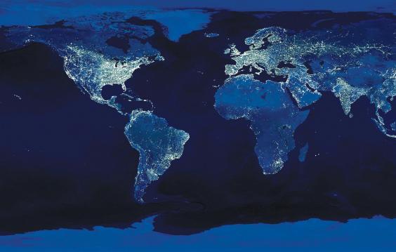 The globe at night, lights in populated areas illuminated