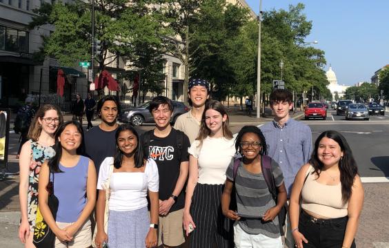 Students from the D.C. Interns program (2022 cohort) pose with the U.S. capitol in the background