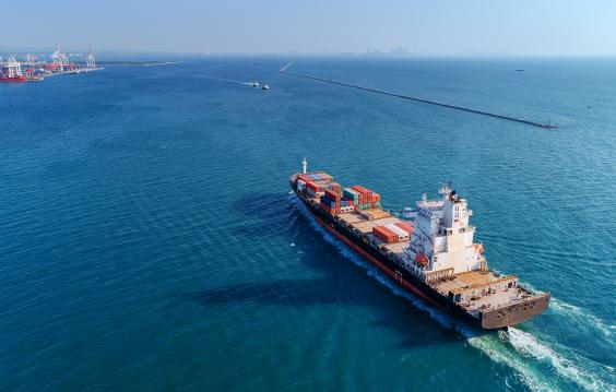  Aerial view container ship going to sea port for import export