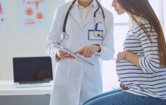 pregnant woman with the doctor at hospital