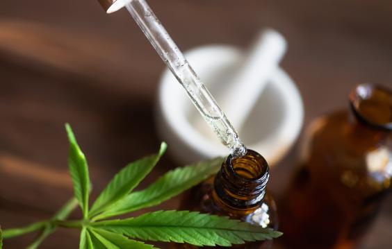 Macro close up of droplet dosing a biological and ecological hemp