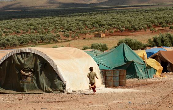 IDLIB, SYRIA - Jun 17, 2013: Internally displaced child Syrian refugees 