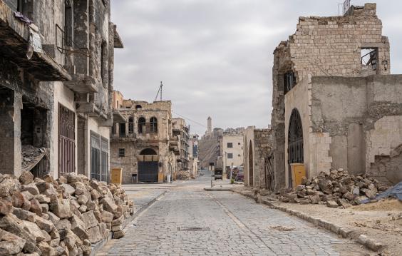 City of Aleppo and destroyed building in Syria.