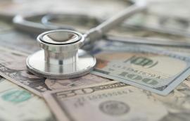 A stethoscope on American paper currency.