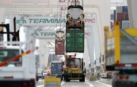 Trucks transport cargo across the U.S.-Mexico border