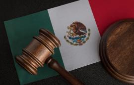 Judge gavel on flag of Mexico. Mexican legislation. 
