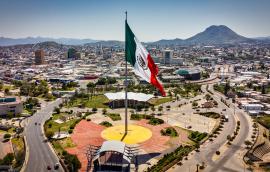 Panoramic view of Chihuahua with Mexican flag