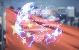 Globe hologram over Chinese flag