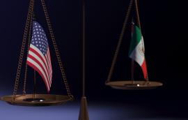 Scale holding Mexican and American flags
