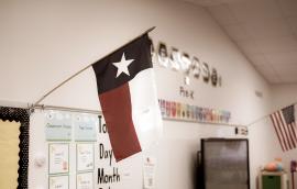 Texas and American flags displayed in pre-kindergarten classroom.