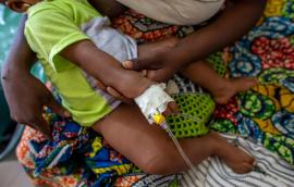 Child receiving treatment at health center at NGO in Dapaong, Togo.