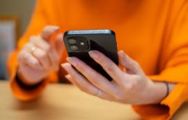 Person scrolling through cellphone