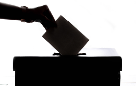 Person dropping off ballot