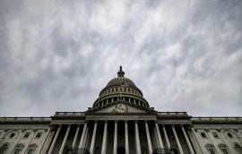 U.S. Capitol with grey sky above