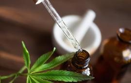 Macro close up of droplet dosing a biological and ecological hemp