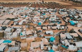 Aerial view of hundreds of tents inhabited by Syrian refugees for years due to the war that destroyed their homes.