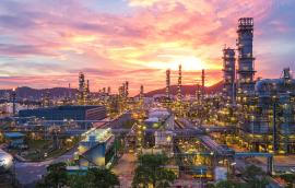 oil refinery at sunset