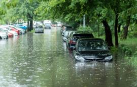 Flooded cars on the street of the city.