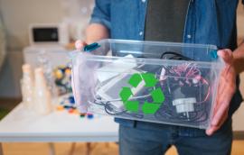 An electronic waste in recycling container close-up.