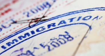 A close-up of an immigration stamp.