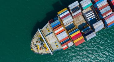 A ship carries cargo for trade.