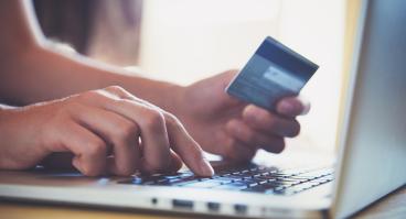 Credit card being used for online shopping