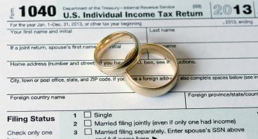 Pair on wedding bands on IRS 1040 Tax form