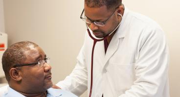 Doctor treating patient