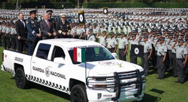 Mexico's president AMLO driving by the Mexican National Guard