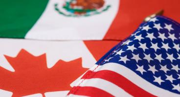 The flags of Canada, Mexico, and the U.S.