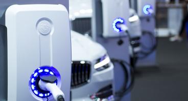 An electric car charges.