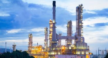 Oil refinery at sunset.
