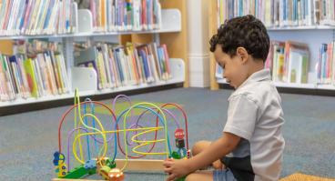 Child playing with toy