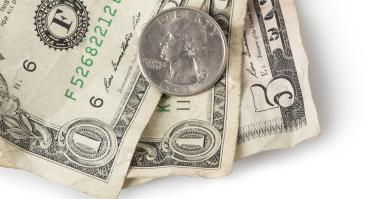 A coin and dollar bills.