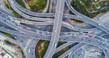 Cars drive on highways.