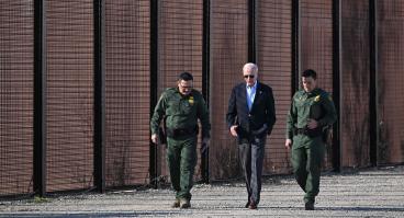 President Biden walks along US border wall