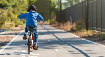 kid riding bike