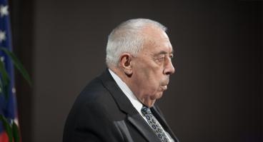 George W.S. Abbey speaks at an event in 2016
