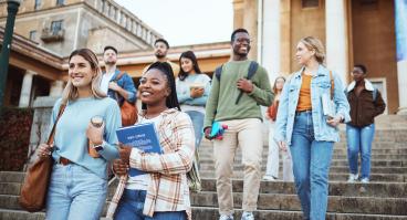 Students walking on university steps