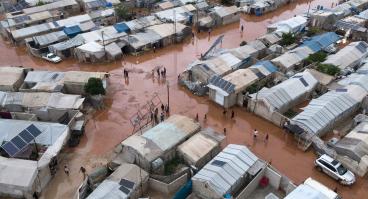 This aerial view shows the camp of Deir Ballut for internally displaced people in the Afrin region of Syria's rebel-held northern Aleppo province, inundated following heavy rainfall on May 24, 2024.