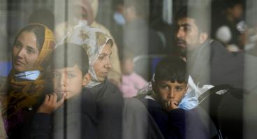 Evacuees from Afghanistan wait to fly to the U.S. at a German air base on Sept. 1, 2021.