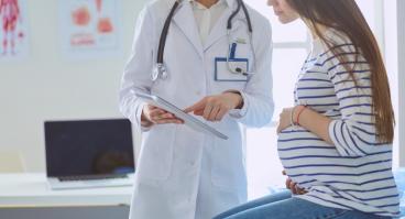 pregnant woman with the doctor at hospital