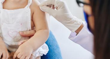 Toddler getting vaccine