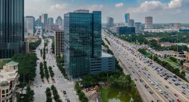 Aerial view of uptown Houston cityscape and Interstate 610