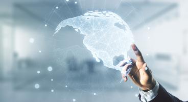 Double exposure of businessman hand working with graphic America map on blurred office background.