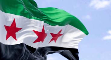 Syria flag waving in sky